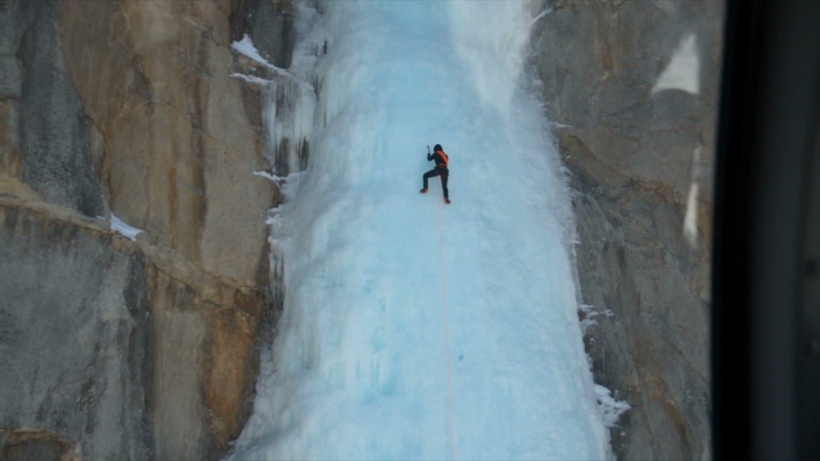 Climber on a frozen waterfall — eyewear spec film